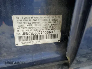 2004 Honda Accord LX z VIN JHMCM56374C006445, wystawiony jako Copart lot #51671195 z przebiegiem 220 193 mil mil oraz Szkoda całkowita • Salvage title. Historia ofert i sprzedaży dostępna na DreamBid. Obrazek 14.