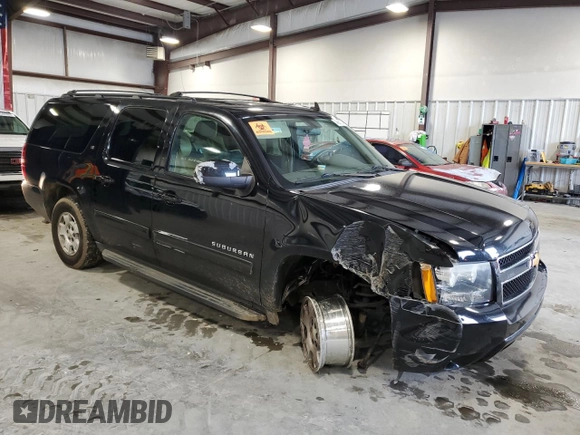 2014 Chevrolet Suburban LT with VIN 1GNSCJE01ER203892, listed as a Copart auction lot 45012795 with 183,901 mi miles and Salvage Title. Bid and sale history available at carsss.com. Image 4.