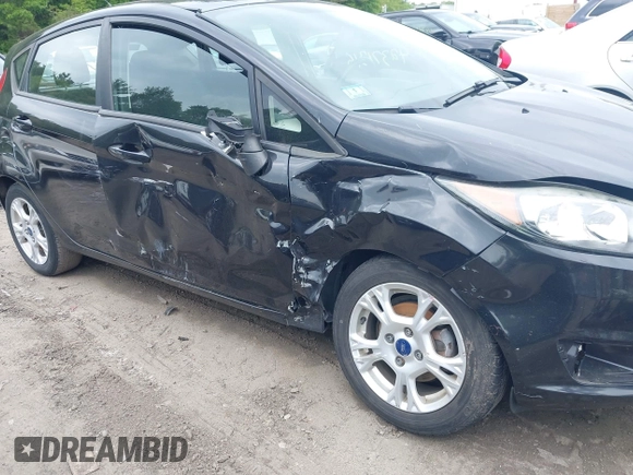 2014 Ford Fiesta SE z VIN 3FADP4EJ3EM205098, wystawiony jako IAAI lot #42371316 z przebiegiem 130 420 mil mil oraz . Historia ofert i sprzedaży dostępna na DreamBid. Obrazek 6.