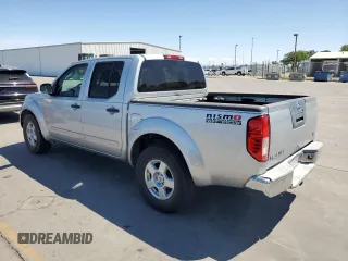 2007 Nissan Frontier SE with VIN 1N6AD07U87C443259, listed as a Copart auction lot 57174005 with 151,480 mi miles and Salvage title. Bid and sale history available at DreamBid. Image 2.