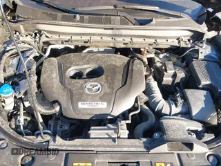 2021 Mazda CX-5 Grand Touring Reserve with VIN JM3KFBAYXM0465762, listed as a IAAI auction lot 40728368 with 30,667 mi miles. Bid and sale history available at carsss.com. Image 10.