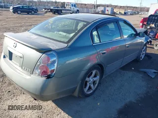 2005 Nissan Altima SE with VIN 1N4BL11E65C118744, listed as a IAAI auction lot 41390942 with 1 mi miles. Bid and sale history available at carsss.com. Image 4.