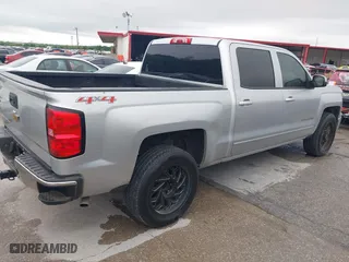 2015 Chevrolet Silverado 1500 LT with VIN 3GCUKREH6FG334200, listed as a IAAI auction lot 41953563 with 201,177 mi miles. Bid and sale history available at carsss.com. Image 4.