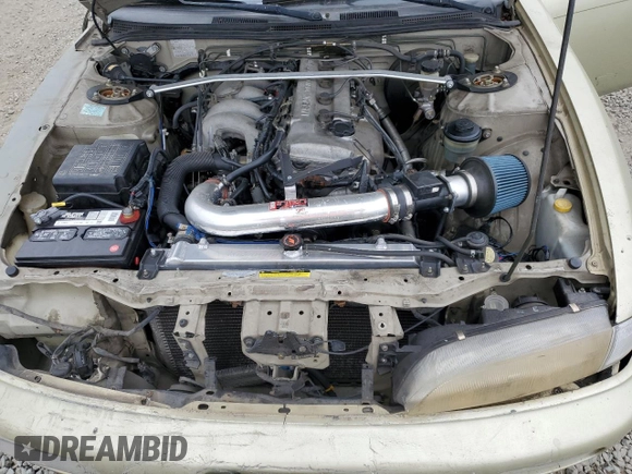 1995 Nissan 240SX z VIN JN1AS44D1SW016276, wystawiony jako Copart lot #50842085 z przebiegiem 258 343 mil mil oraz Szkoda całkowita • Salvage title. Historia ofert i sprzedaży dostępna na DreamBid. Obrazek 11.