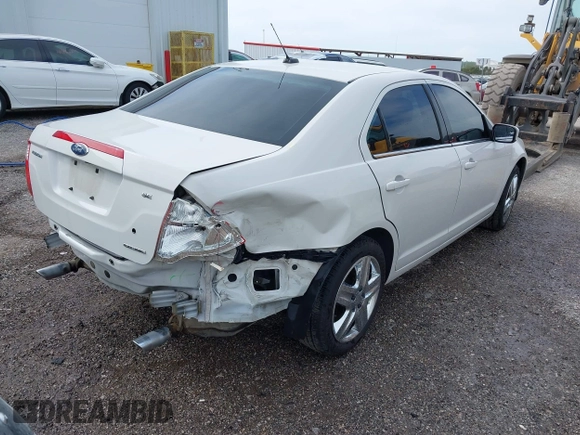 2011 Ford Fusion SE with VIN 3FAHP0HG3BR140455, listed as a IAAI auction lot 42020910 with 90,916 mi miles. Bid and sale history available at carsss.com. Image 4.