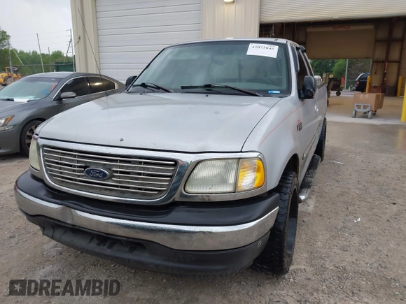 2003 Ford F-150 XL with VIN 1FTRX17253NA74389, listed as a IAAI auction lot 42072045 with 166,572 mi miles. Bid and sale history available at carsss.com. Image 6.