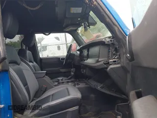 2022 Ford Bronco с VIN 1FMEE5DP7NLB05406, выставлен на аукционе IAAI как лот 42607701 с пробегом 38 206 миль миль и . История ставок и продаж доступна на DreamBid. Изображение 5.