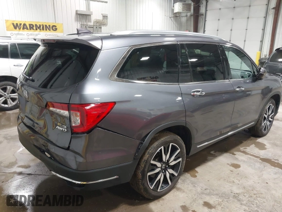 2019 Honda Pilot Touring 7-Passenger с VIN 5FNYF6H68KB082089, выставлен на аукционе IAAI как лот 42616148 с пробегом 69 913 миль миль и . История ставок и продаж доступна на DreamBid. Изображение 4.