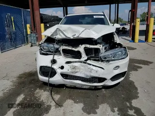 2016 BMW X5 xDrive35i z VIN 5UXKR0C59G0S93508, wystawiony jako Copart lot #55920795 z przebiegiem 127 416 mil mil oraz Szkoda całkowita • Salvage title. Historia ofert i sprzedaży dostępna na DreamBid. Obrazek 14.