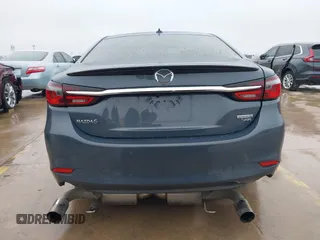 2021 Mazda 6 Carbon Edition with VIN JM1GL1WY0M1600414, listed as a IAAI auction lot 41551393 with 36,780 mi miles and . Bid and sale history available at DreamBid. Image 16.