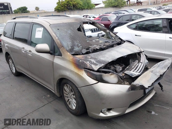 2015 Toyota Sienna XLE with VIN 5TDYK3DC5FS545345, listed as a IAAI auction lot 42280661 with Not provided miles and . Bid and sale history available at DreamBid. Image 1.