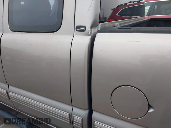 2000 Chevrolet Silverado 1500 with VIN 2GCEC19WXY1357051, listed as a IAAI auction lot 41535946 with 154,163 mi miles and . Bid and sale history available at DreamBid. Image 18.