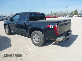2011 GMC Canyon SLE1 with VIN 1GTH6MFE5B8104838, listed as a IAAI auction lot 42120959 with 188,277 mi miles. Bid and sale history available at carsss.com. Image 3.