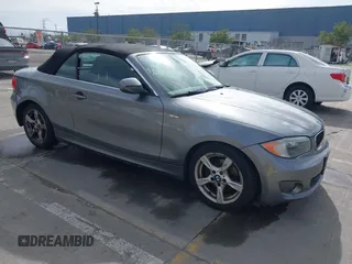 2012 BMW 1 Series 128i with VIN WBAUN1C52CVR00421, listed as a IAAI auction lot 41594256 with 107,957 mi miles and . Bid and sale history available at DreamBid. Image 1.