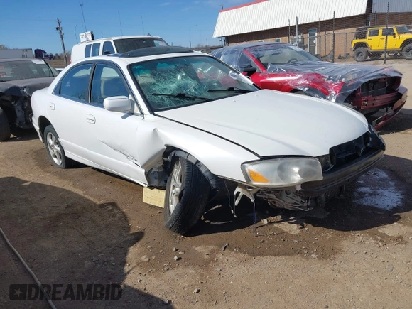 2002 Mazda Millenia S with VIN JM1TA222821725749, listed as a IAAI auction lot 41662948 with 165,088 mi miles and . Bid and sale history available at DreamBid. Image 1.