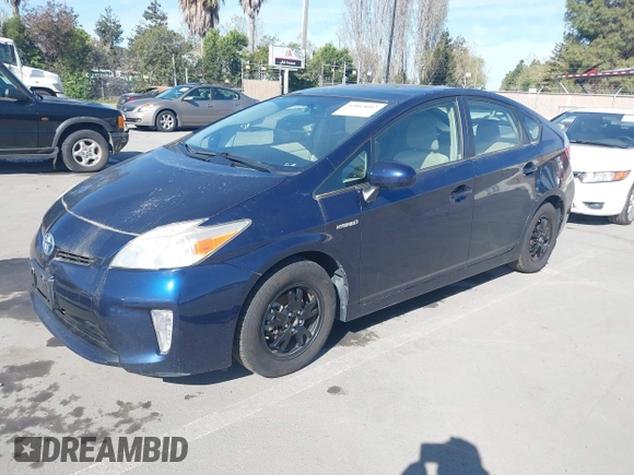 2013 Toyota Prius One with VIN JTDKN3DU0D1623630, listed as a IAAI auction lot 42015052 with 213,796 mi miles. Bid and sale history available at carsss.com. Image 2.