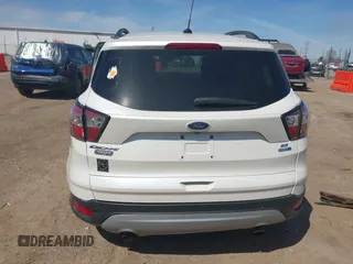 2018 Ford Escape SE z VIN 1FMCU9GD4JUB06181, wystawiony jako IAAI lot #42046708 z przebiegiem 160 987 mil mil oraz . Historia ofert i sprzedaży dostępna na DreamBid. Obrazek 17.