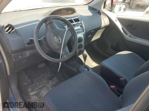 2011 Toyota Yaris with VIN JTDJT4K35B5330328, listed as a Copart auction lot 46904665 with 107,100 mi miles and Salvage Title. Bid and sale history available at carsss.com. Image 8.