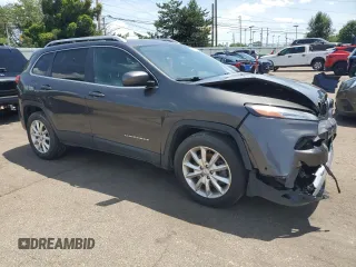 2014 Jeep Cherokee Limited with VIN 1C4PJMDS4EW211057, listed as a Copart auction lot 63448375 with Not provided miles and Salvage title. Bid and sale history available at DreamBid. Image 4.