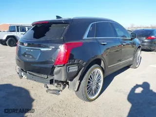 2017 Cadillac XT5 FWD with VIN 1GYKNARS3HZ122969, listed as a IAAI auction lot 41421230 with 116,603 mi miles. Bid and sale history available at carsss.com. Image 4.