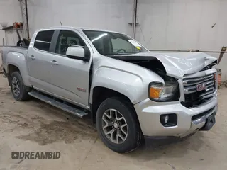 2015 GMC Canyon 4WD SLE z VIN 1GTG6BE39F1252926, wystawiony jako IAAI lot #42128396 z przebiegiem 113 139 mil mil oraz . Historia ofert i sprzedaży dostępna na DreamBid. Obrazek 1.