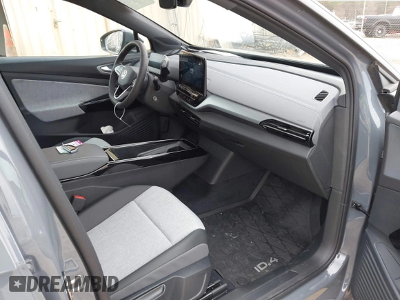 2023 Volkswagen ID.4 Pro z VIN 1V2DNPE85PC048594, wystawiony jako IAAI lot #41760977 z przebiegiem 623 mil mil oraz . Historia ofert i sprzedaży dostępna na DreamBid. Obrazek 5.