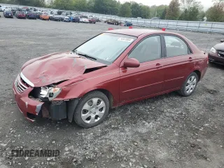 2007 Kia Spectra EX with VIN KNAFE121X75381938, listed as a Copart auction lot 74341004 with 118,890 mi miles and Salvage Title. Bid and sale history available at carsss.com. Image 1.