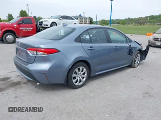 2022 Toyota Corolla LE with VIN 5YFEPMAE9NP349268, listed as a IAAI auction lot 39291224 with 52,228 mi miles. Bid and sale history available at carsss.com. Image 4.