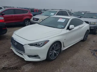 2018 Infiniti Q60 3.0t LUXE with VIN JN1EV7EK8JM340276, listed as a IAAI auction lot 41464169 with 102,866 mi miles. Bid and sale history available at carsss.com. Image 2.