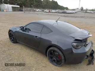 2014 Scion FR-S with VIN JF1ZNAA12E8702261, listed as a IAAI auction lot 41971045 with 124,341 mi miles and . Bid and sale history available at DreamBid. Image 3.