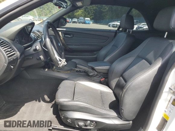 2010 BMW 1 Series 128i with VIN WBAUN1C50AVH81851, listed as a Copart auction lot 56607275 with 145,036 mi miles and Salvage title. Bid and sale history available at DreamBid. Image 7.