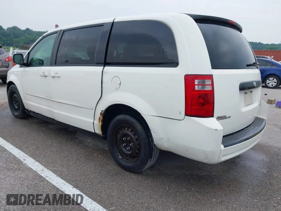 2009 Dodge Grand Caravan SE with VIN 1D8HN44E49B511845, listed as a IAAI auction lot 42490697 with 379,412 mi miles and . Bid and sale history available at DreamBid. Image 3.