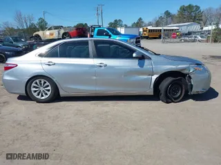 2015 Toyota Camry XLE with VIN 4T4BF1FK1FR448062, listed as a IAAI auction lot 41882344 with 121,490 mi miles. Bid and sale history available at carsss.com. Image 13.