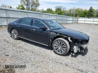 2019 Audi A8 with VIN WAU8DAF88KN016914, listed as a Copart auction lot 57621665 with 47,647 mi miles and Salvage title. Bid and sale history available at DreamBid. Image 4.