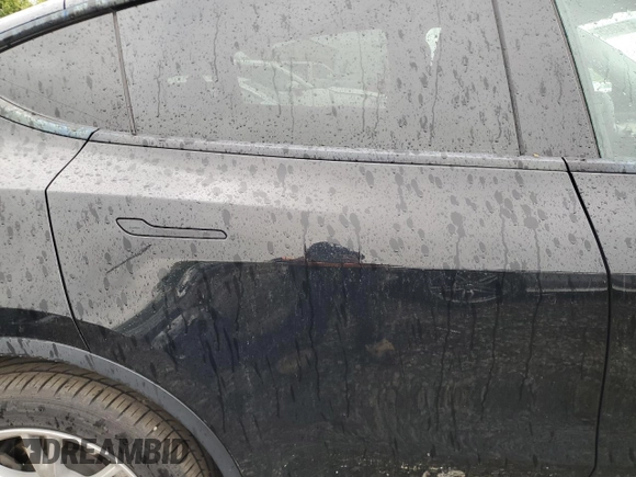 2022 Tesla Model Y Long Range z VIN 7SAYGDEE2NF313492, wystawiony jako Copart lot #55748695 z przebiegiem Nie podano mil oraz Szkoda całkowita • Salvage title. Historia ofert i sprzedaży dostępna na DreamBid. Obrazek 10.