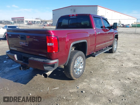 2017 GMC Sierra 2500HD Denali z VIN 1GT12UEY0HF186720, wystawiony jako IAAI lot #41580466 z przebiegiem Nie podano mil oraz . Historia ofert i sprzedaży dostępna na DreamBid. Obrazek 4.