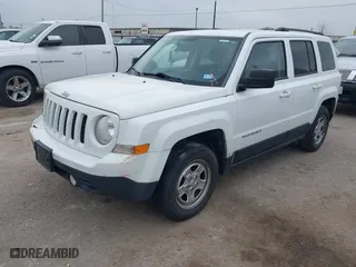 2016 Jeep Patriot Sport with VIN 1C4NJPBBXGD562646, listed as a IAAI auction lot 41929451 with 170,460 mi miles. Bid and sale history available at carsss.com. Image 2.