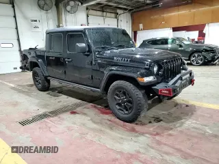 2021 Jeep Gladiator Willys with VIN 1C6HJTAG4ML556255, listed as a Copart auction lot 57143125 with 57,104 mi miles and Salvage title. Bid and sale history available at DreamBid. Image 13.