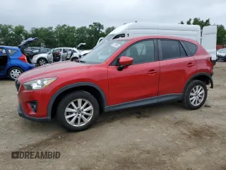 2014 Mazda CX-5 Touring with VIN JM3KE2CY3E0315882, listed as a Copart auction lot 61726655 with 93,258 mi miles and Salvage title. Bid and sale history available at DreamBid. Image 1.