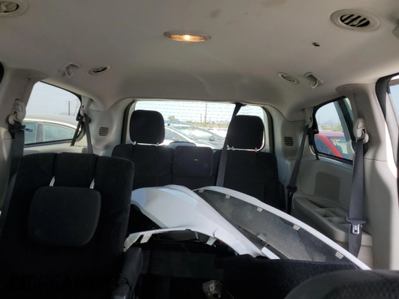 2017 Dodge Grand Caravan SE Plus z VIN 2C4RDGBG1HR864328, wystawiony jako Copart lot #56435325 z przebiegiem 128 795 mil mil oraz Szkoda całkowita • Salvage title. Historia ofert i sprzedaży dostępna na DreamBid. Obrazek 10.