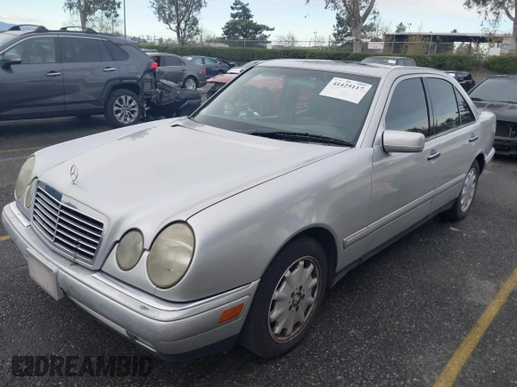 1997 Mercedes-Benz E-Class with VIN WDBJF55FXVJ033553, listed as a IAAI auction lot 41425117 with 280,019 mi miles. Bid and sale history available at carsss.com. Image 16.