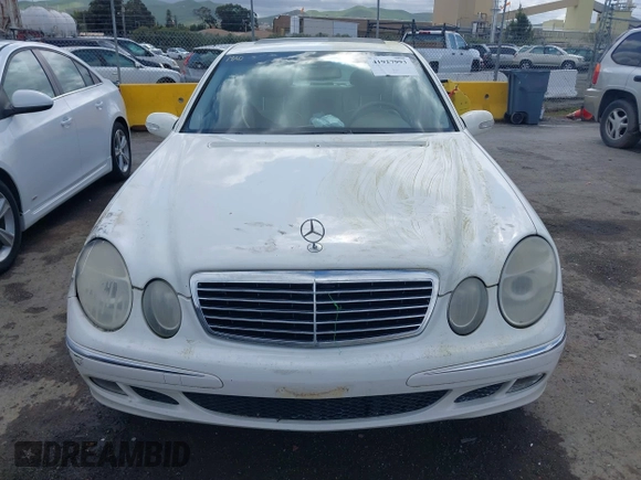 2003 Mercedes-Benz E-Class 3.2L with VIN WDBUF65J23A120318, listed as a IAAI auction lot 41927993 with 113,578 mi miles. Bid and sale history available at carsss.com. Image 12.