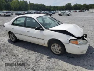 1997 Ford Escort LX z VIN 1FALP13P8VW205888, wystawiony jako Copart lot #70588004 z przebiegiem 156 013 mil mil oraz Nie do naprawy • Non repairable. Historia ofert i sprzedaży dostępna na DreamBid. Obrazek 4.