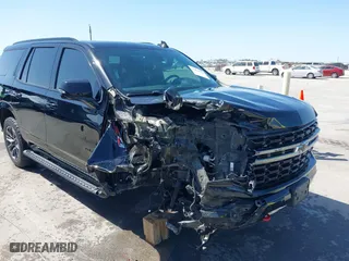 2021 Chevrolet Tahoe Z71 with VIN 1GNSKPKD2MR124128, listed as a IAAI auction lot 41874524 with 75,066 mi miles. Bid and sale history available at carsss.com. Image 6.