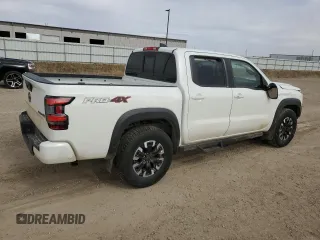 2022 Nissan Frontier Pro-4X z VIN 1N6ED1EK0NN668348, wystawiony jako Copart lot #52364335 z przebiegiem 50 861 mil mil oraz Szkoda całkowita • Salvage title. Historia ofert i sprzedaży dostępna na DreamBid. Obrazek 3.