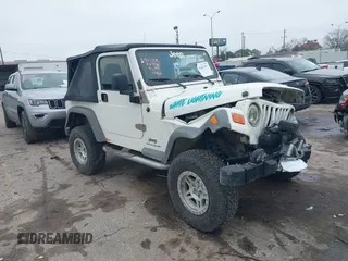 2005 Jeep Wrangler Sport with VIN 1J4FA49S25P320240, listed as a IAAI auction lot 41433371 with 144,552 mi miles. Bid and sale history available at carsss.com. Image 1.