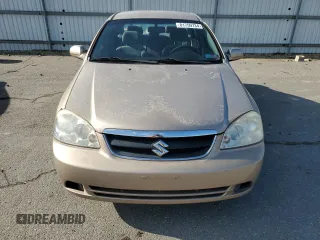 2008 Suzuki Forenza z VIN KL5JD56Z88K306719, wystawiony jako Copart lot #81759734 z przebiegiem 58 759 mil mil oraz Tytuł czysty. Historia ofert i sprzedaży dostępna na DreamBid. Obrazek 5.