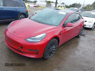 2021 Tesla Model 3 Performance with VIN 5YJ3E1EC5MF050598, listed as a IAAI auction lot 41778169 with 74,710 mi miles and . Bid and sale history available at carsss.com. Image 22.