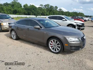 2012 Audi A7 Prestige z VIN WAUSGAFC3CN025880, wystawiony jako Copart lot #58922235 z przebiegiem 148 652 mil mil oraz Szkoda całkowita • Salvage title. Historia ofert i sprzedaży dostępna na DreamBid. Obrazek 4.