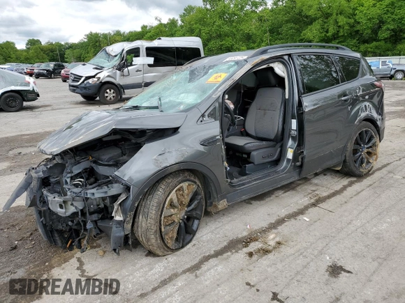 2017 Ford Escape SE z VIN 1FMCU9GD7HUB76204, wystawiony jako Copart lot #58334725 z przebiegiem Nie podano mil oraz Szkoda całkowita • Salvage title. Historia ofert i sprzedaży dostępna na DreamBid. Obrazek 1.